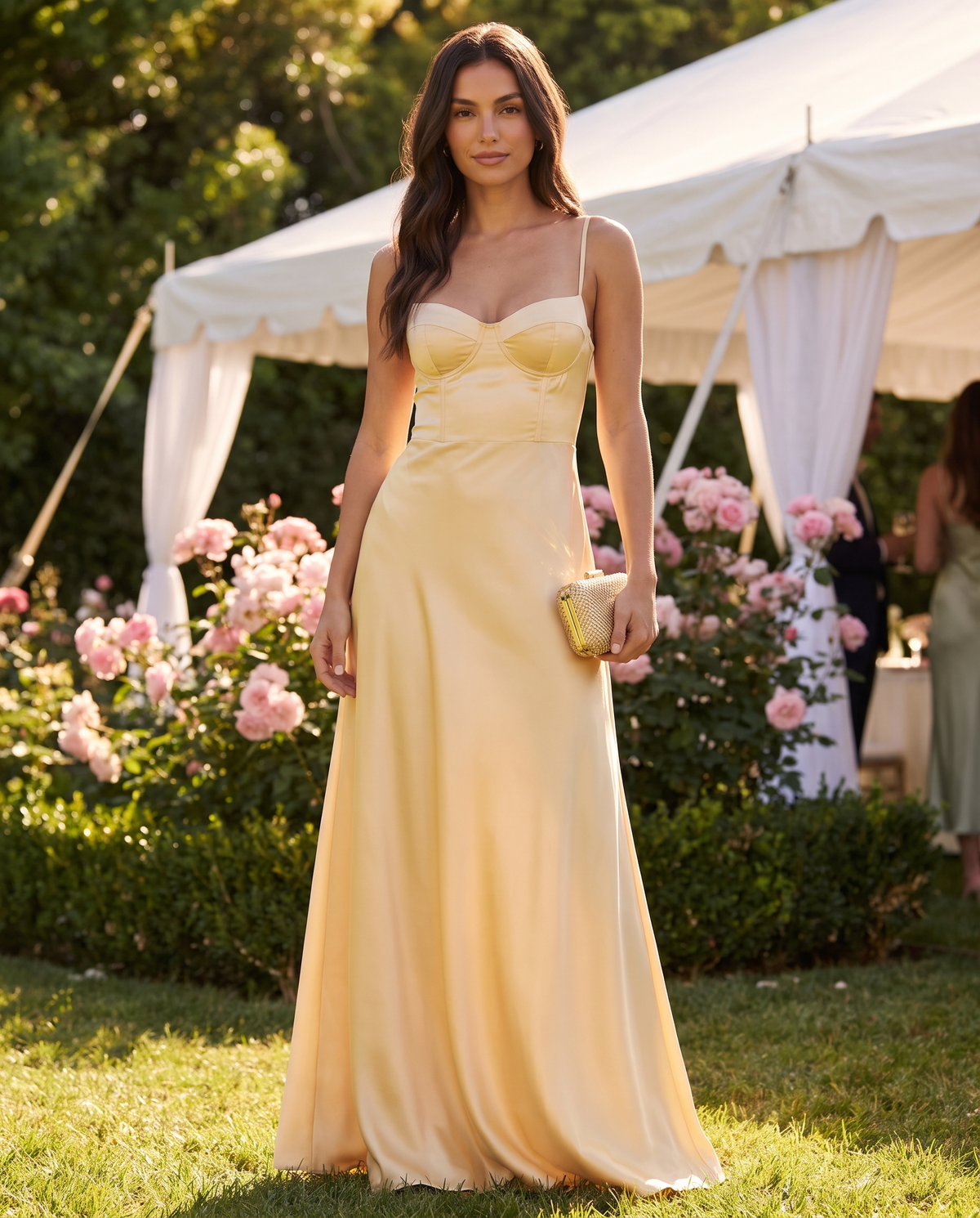 Gianna Satin Bustier Maxi Dress in Soft Gold at a spring garden party