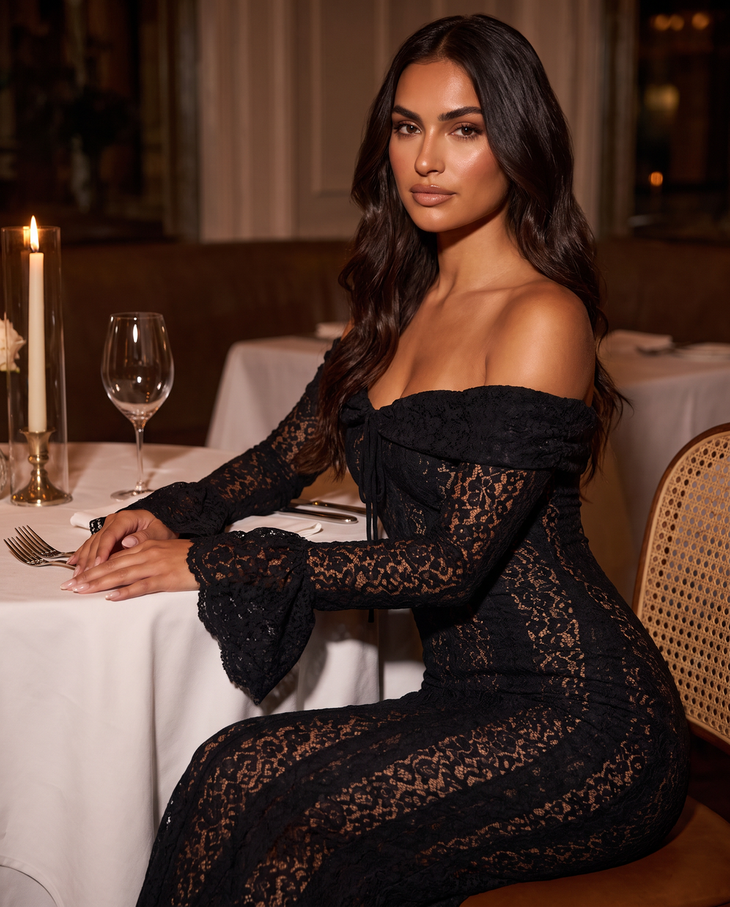 Isabella Lace Maxi Dress in Black, lace sleeve detail at a candlelit dinner